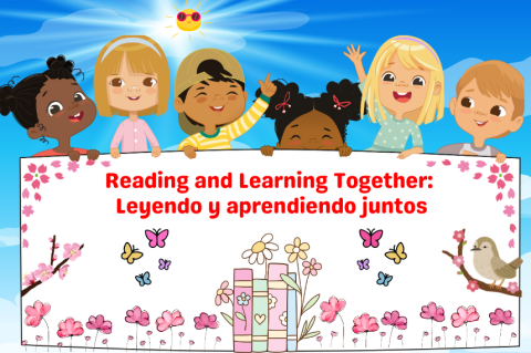 children standing behind a sign with images of spring flowers, birds and bees