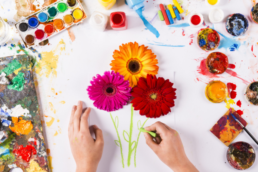 art supplies and flower artwork