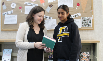 Ms Kate-Lynn helping a teen